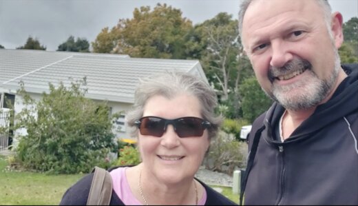 Wealth Mentor members outside the property they went unconditional on