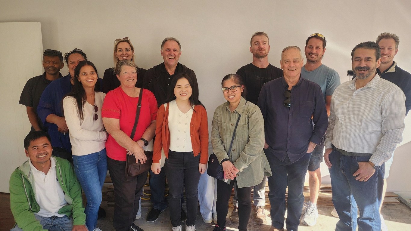 Wealth Mentor members together at a renovation project