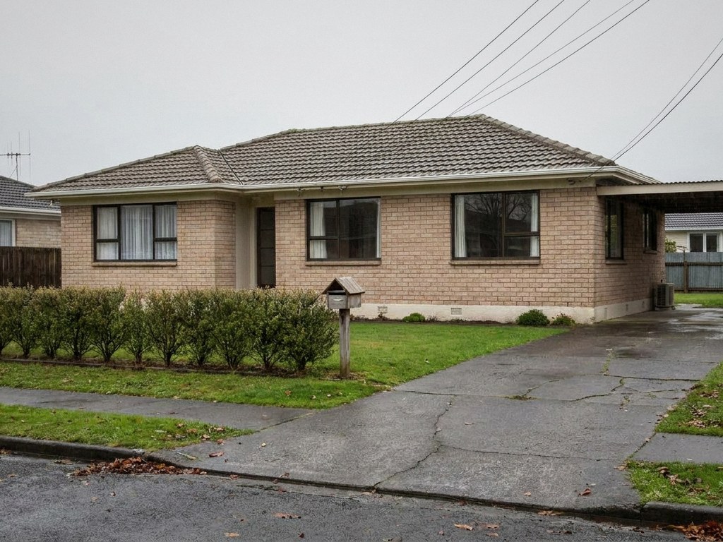 A typical New Zealand brick-and-tile rental
